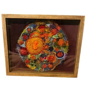 Hand-crafted bead embroidered framed tapestry.